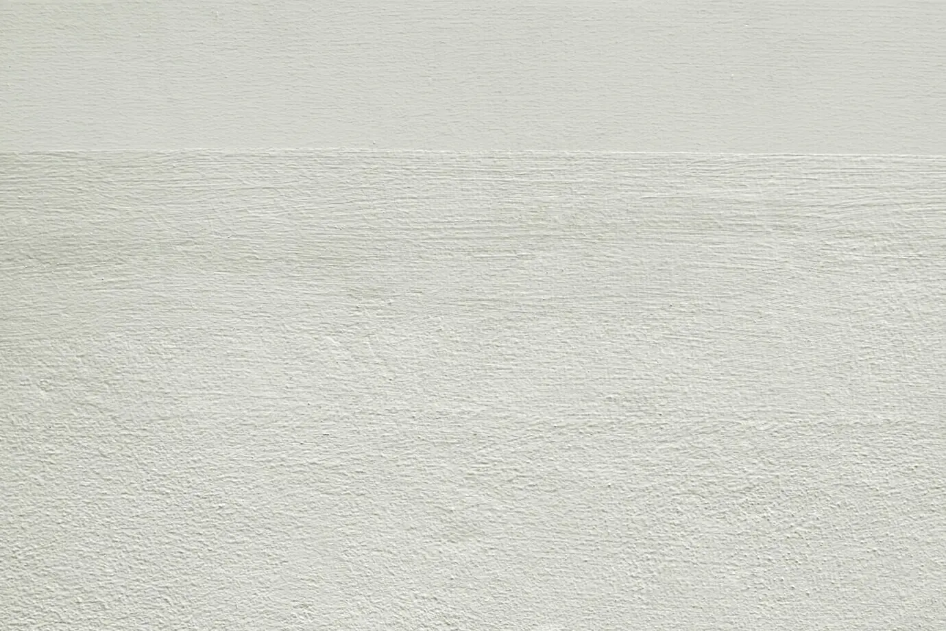 Beiger Hintergrund mit schlichter Betontextur